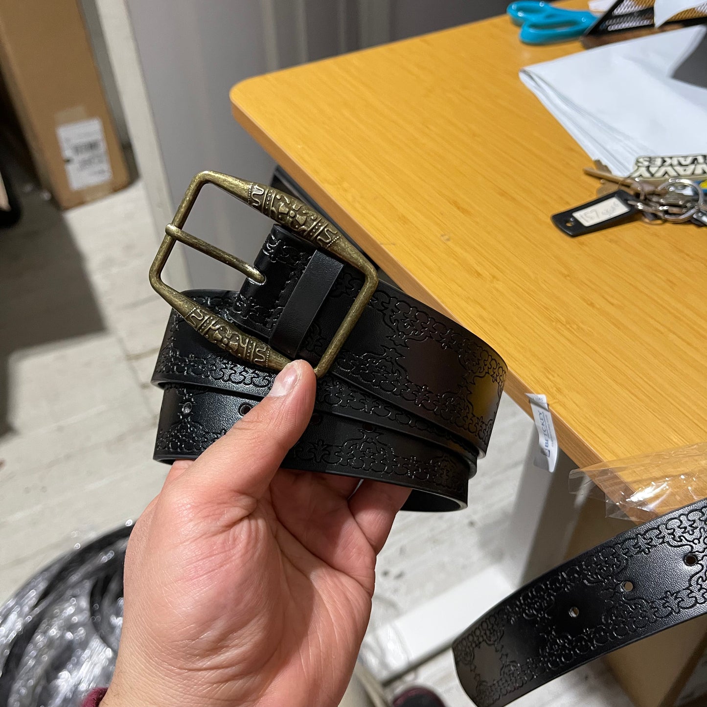 Black engraved gold buckle belt