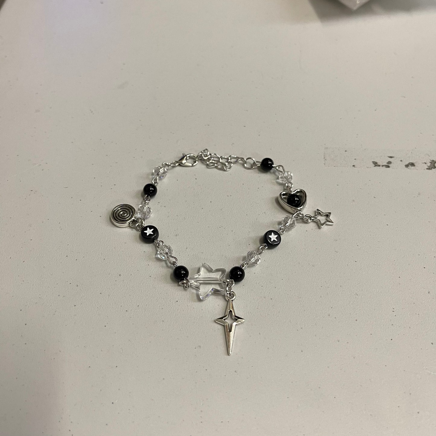 Star Charms Bracelet, Black & Silver.
